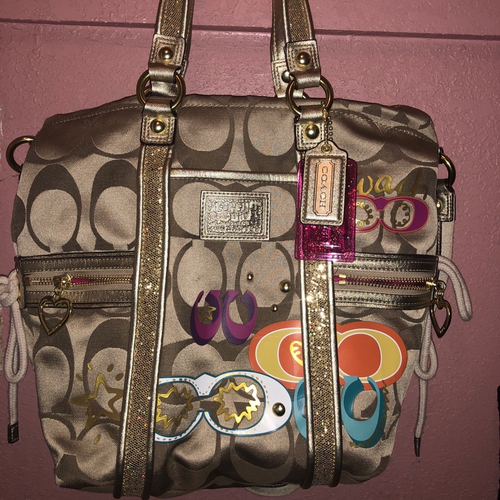 Daisy Signature Coach Purse, Poppy Collection